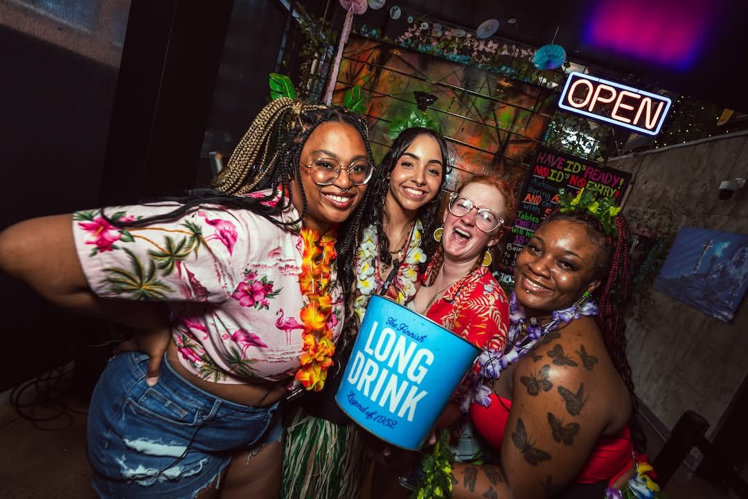 Hookava bartenders in tropical shirts with el Jimador tequila at a Crawl Reno event