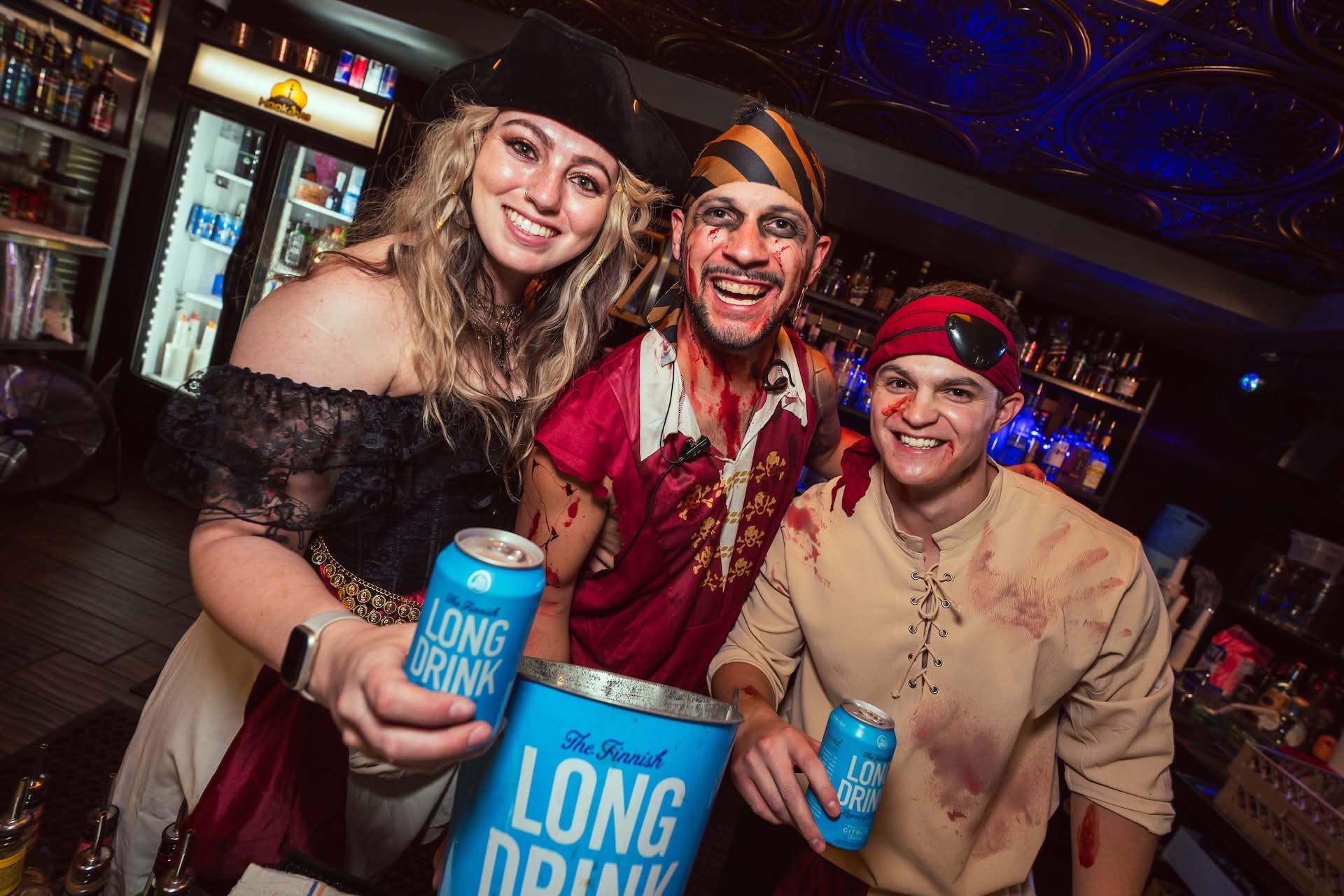 Costumed guests at Hookava during Zombie Crawl with Long Drink cans
