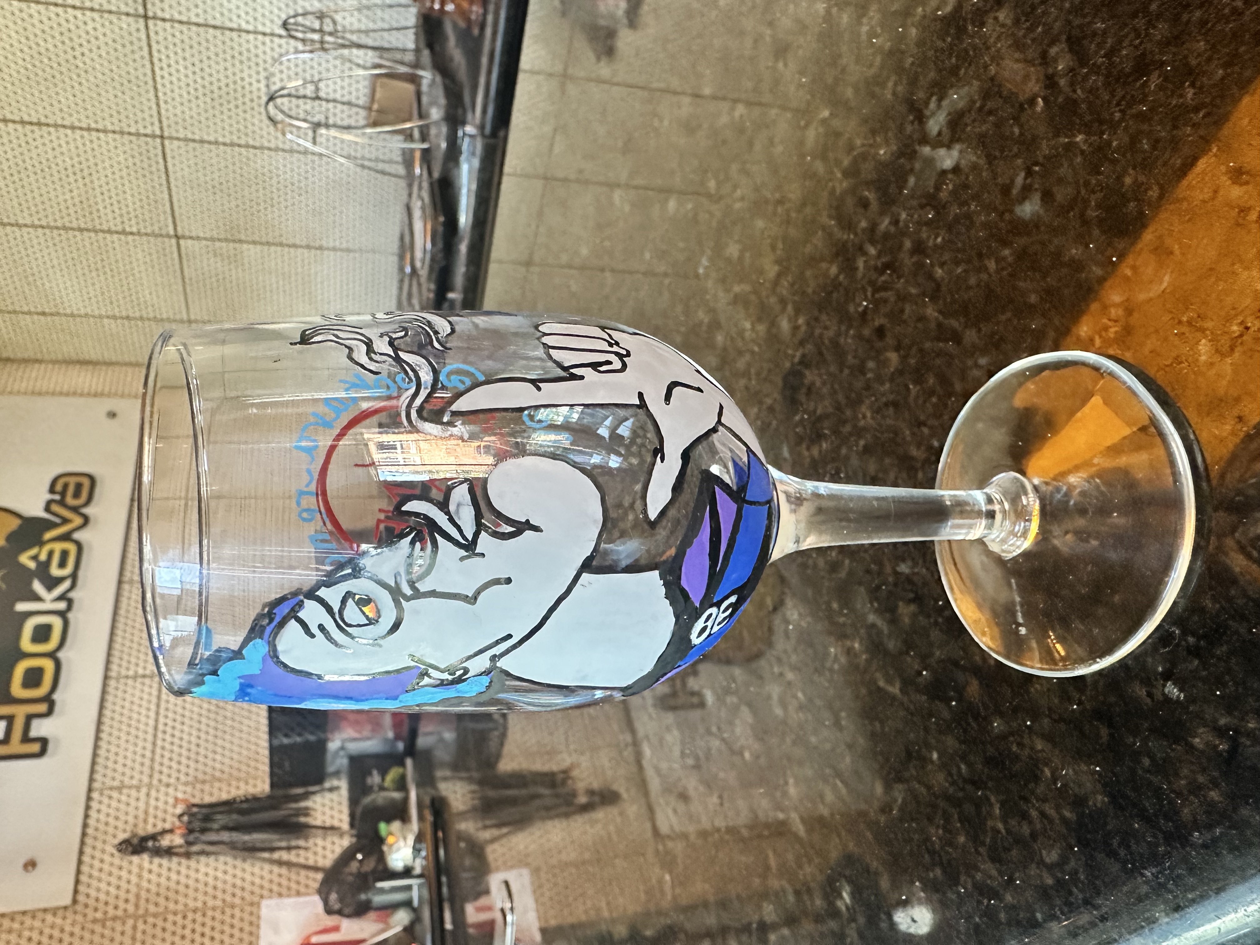 Hand-painted Gandalf wine glass at Hookava bar
