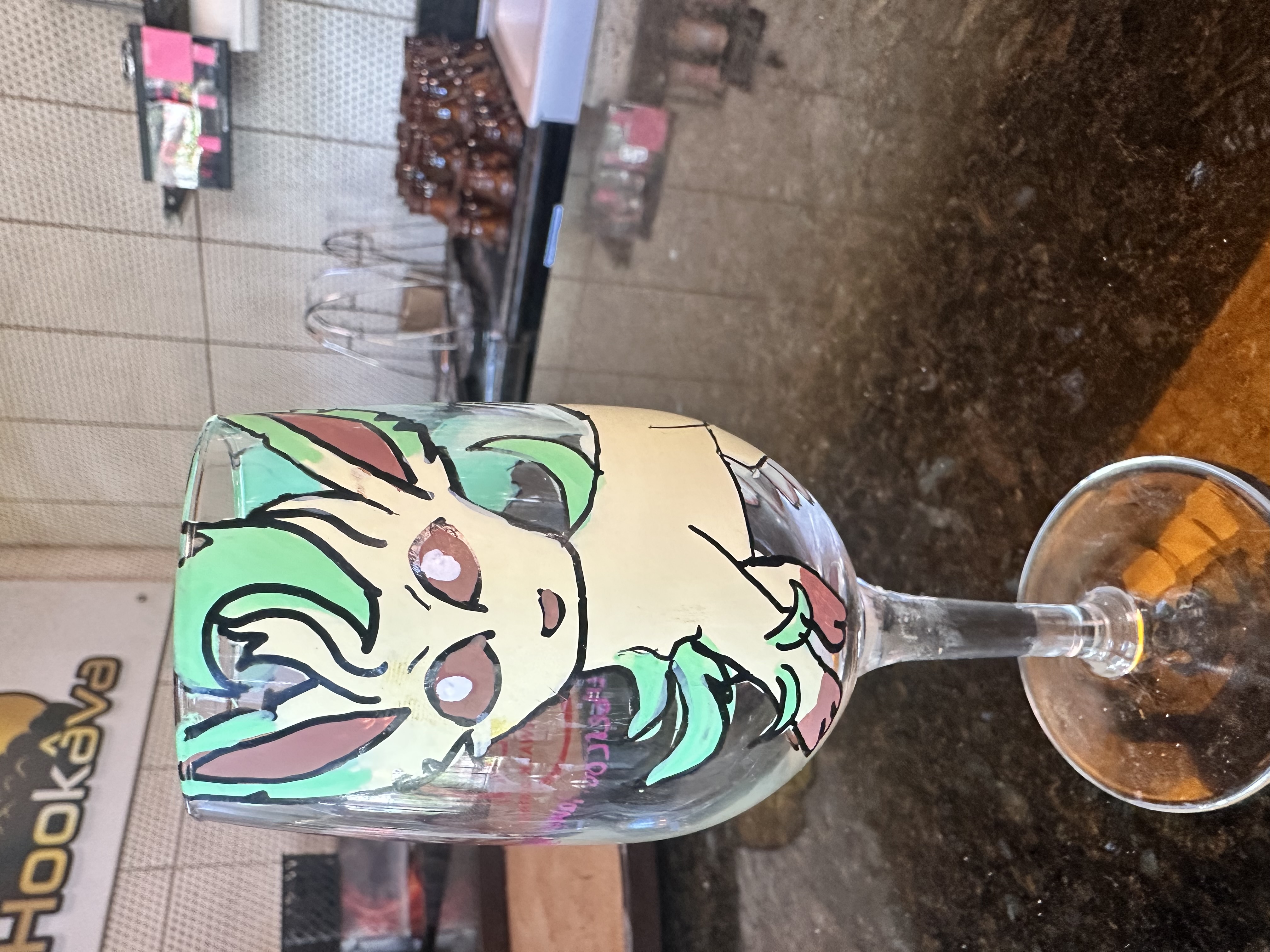 Hand-painted Leafeon Pokémon wine glass at Hookava bar